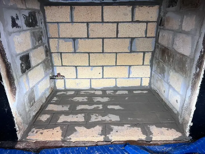 The same firebox rebuilt with new firebrick
