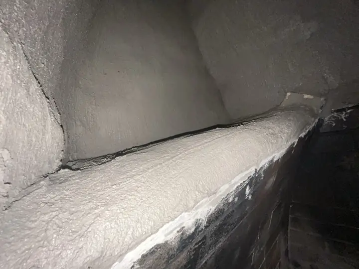 Smoke chamber sealed smooth with heat-rated material